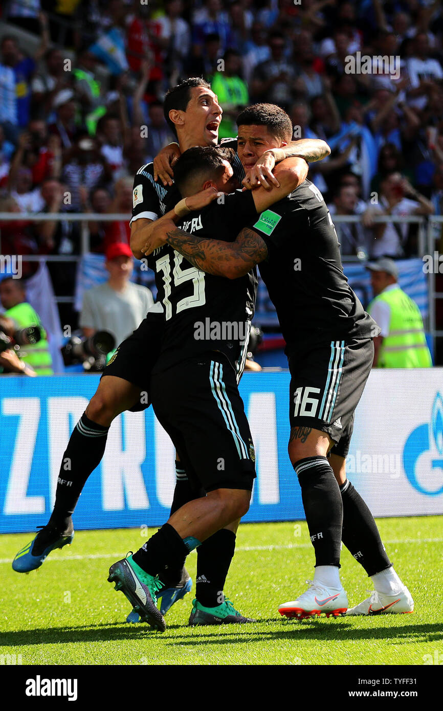 Sergio Aguero (C) of Argentina celebrates scoring the opening goal with team-mates Angel Di Maria (L) and Marcos Rojo during the 2018 FIFA World Cup Group D match at Spartak Stadium in Moscow, Russia on June 16, 2018. Photo by Chris Brunskill/UPI Stock Photo
