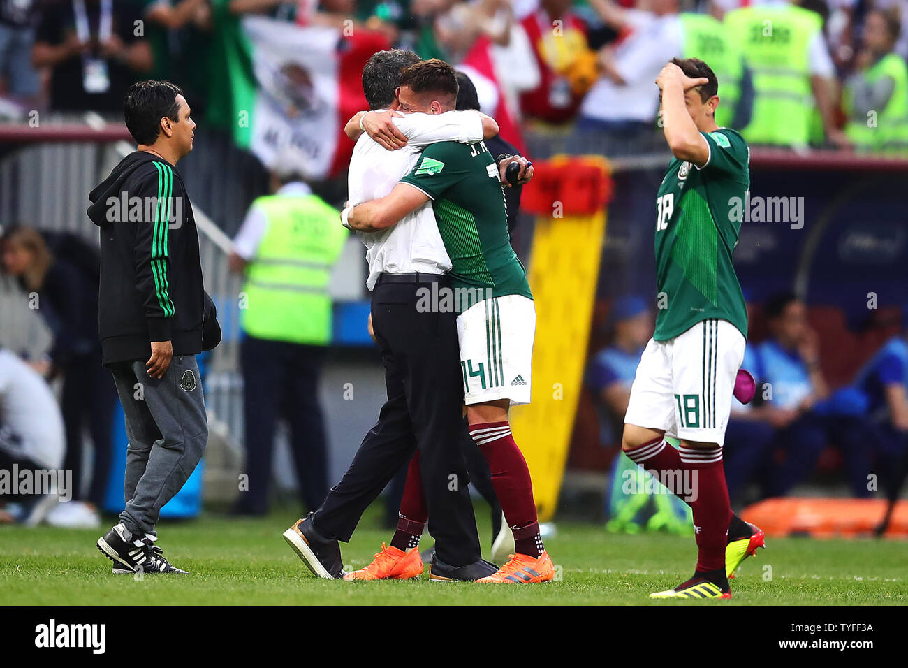 Mexico coach Juan Carlos Osorio embraces Javier Hernandez at full-time following the 2018 FIFA World Cup Group F match at the Luzhniki Stadium in Moscow, Russia on June 17, 2018. Photo by Chris Brunskill/UPI Stock Photo