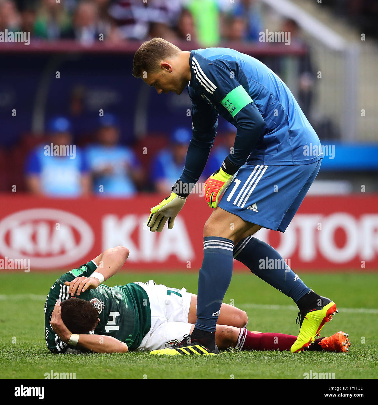 Manuel Neuer of Germany stands over Javier Hernandez of Mexico as he lies injured during the 2018 FIFA World Cup Group F match at the Luzhniki Stadium in Moscow, Russia on June 17, 2018. Photo by Chris Brunskill/UPI Stock Photo