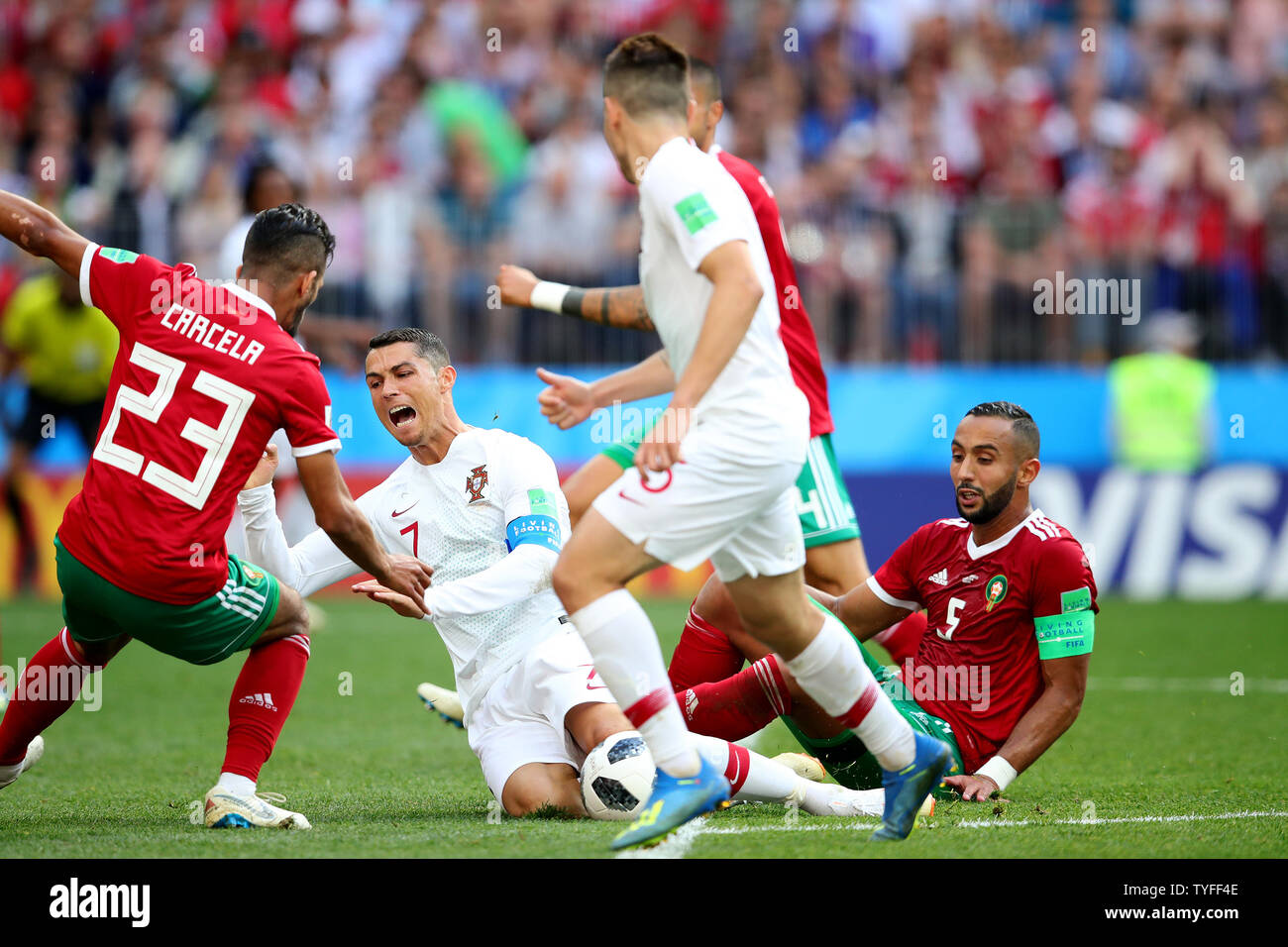 Cristiano Ronaldo (R) of Portugal is fouled by Mehdi Benatia of Morocco during the 2018 FIFA World Cup Group B match at the Luzhniki Stadium in Moscow, Russia on June 20, 2018. Photo by Chris Brunskill/UPI Stock Photo