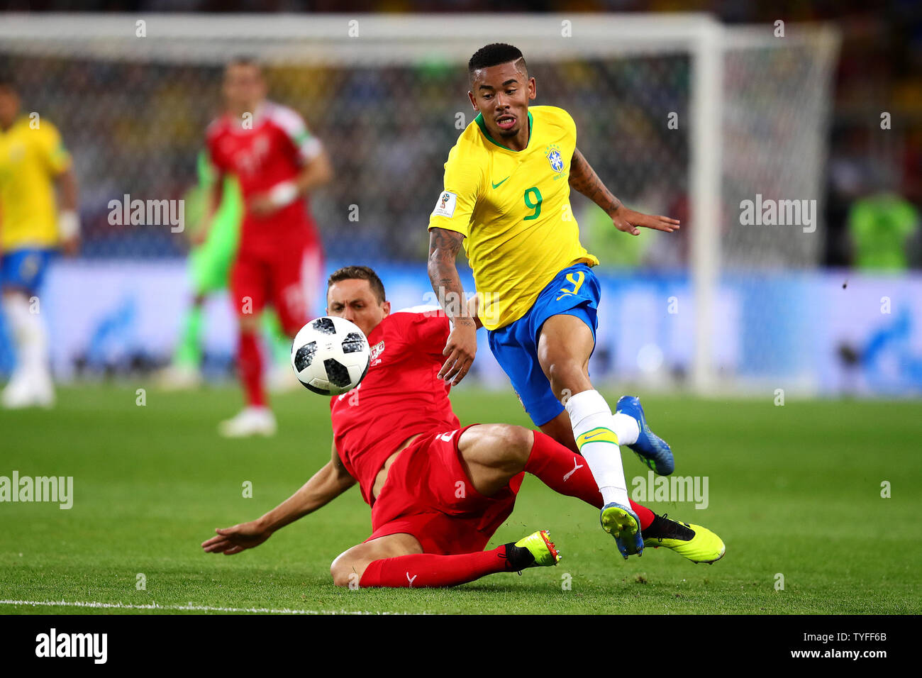 Gabriel Jesus (L) of Brazil is challenged by Nemanja Matic of Serbia during the 2018 FIFA World Cup Group E match at Spartak Stadium in Moscow, Russia on June 27, 2018. Brazil beat Serbia 2-0 to qualify for the round of 16. Photo by Chris Brunskill/UPI Stock Photo