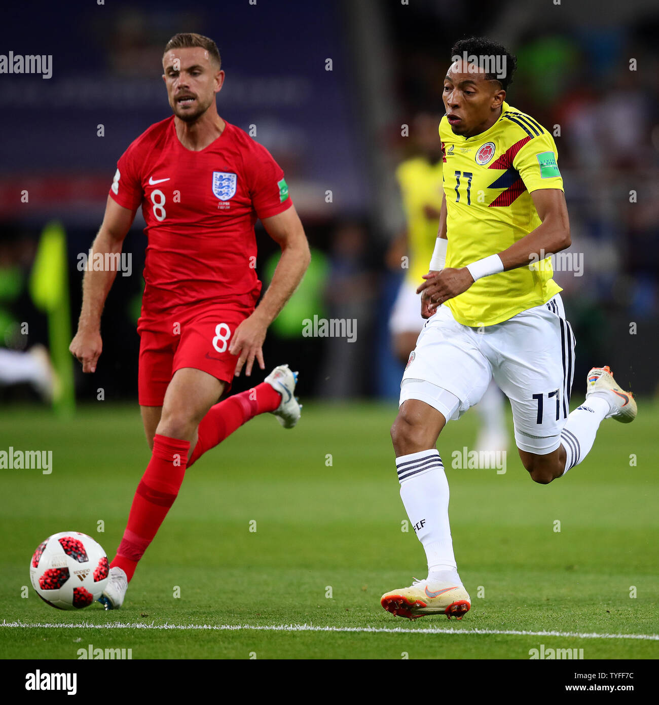 Jordan Henderson (R) of England chases Johan Mojica of Colombia during the 2018 FIFA World Cup Round of 16 match at Spartak Stadium in Moscow, Russia on July 3, 2018. England beat Colombia 4-3 on penalties to qualify for the quarter-finals. Photo by Chris Brunskill/UPI Stock Photo
