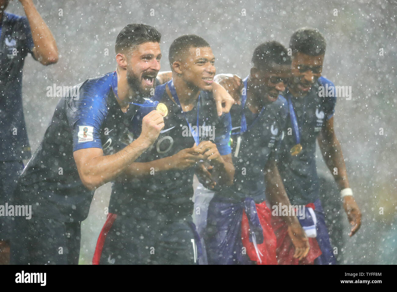 Olivier Giroud (L) and Kylian Mbappe of France celebrate following the 2018 FIFA World Cup final match at Luzhniki Stadium in Moscow, Russia on July 15, 2018. France beat Croatia 4-2. Photo by Chris Brunskill/UPI Stock Photo