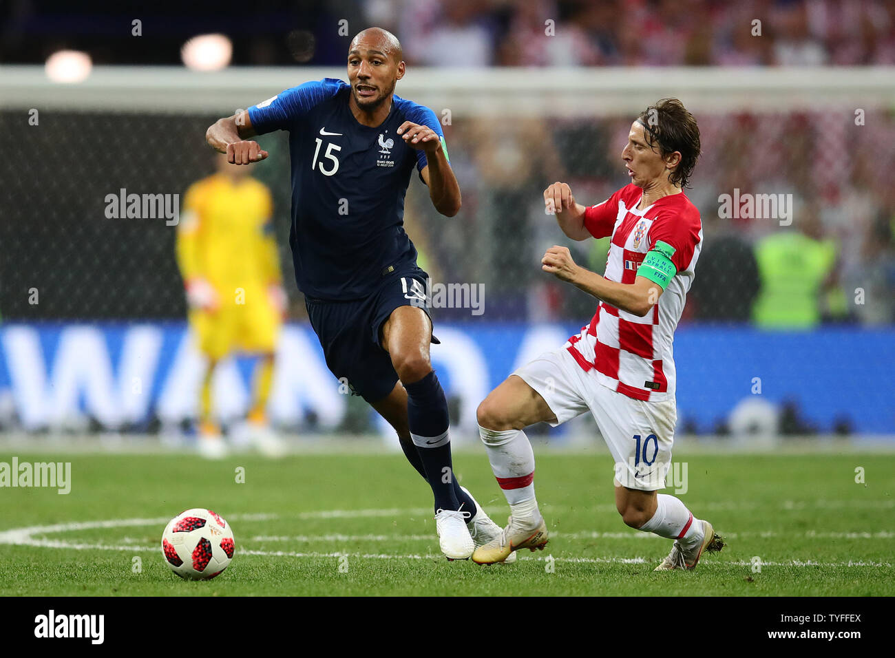 Steven Nzonzi (L) of France competes for the ball with Luka Modric of Croatia during the 2018 FIFA World Cup final match at Luzhniki Stadium in Moscow, Russia on July 15, 2018. France beat Croatia 4-2. Photo by Chris Brunskill/UPI Stock Photo