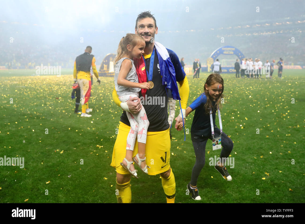 Hugo Lloris of France celebrates with his daughters following the 2018 FIFA World Cup final match at Luzhniki Stadium in Moscow, Russia on July 15, 2018. France beat Croatia 4-2. Photo by Chris Brunskill/UPI Stock Photo