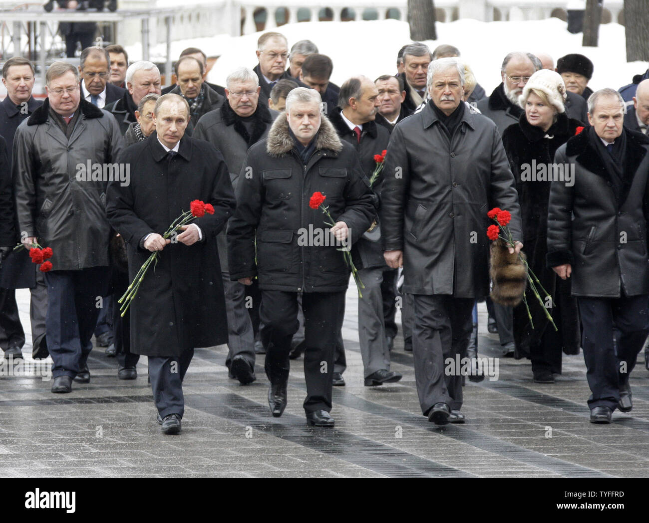 (L-R) Russian Prime Minister Vladimir Putin, Federation Council speaker Sergei Mironov, Parliament speaker  Boris Gryzlov and the Constitutional Court chairman Valery Zorkin take part in the ceremony to light the eternal flame at the Tomb of the Unknown Soldier outside the Kremlin in Moscow on February 23, 2010. The eternal flame was temporarily moved for three months during constructions of the Tomb of the Unknown Soldier and relighted today to to mark the Defender of the Fatherland Day in Russia. UPI/Alexander Natin Stock Photo