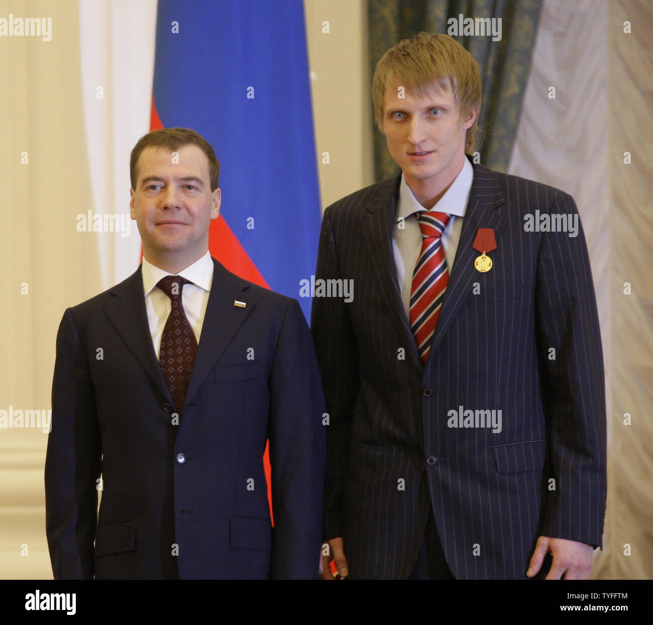 Russian President Dmitry Medvedev (L) presents the Order of Merit for the Fatherland, first class, to speed skater Ivan Skobrev in the Kremlin in Moscow on March 15, 2010. Skobrev won silver and bronze medals at the Winter Olympic Games in Vancouver. UPI/Alex Natin Stock Photo