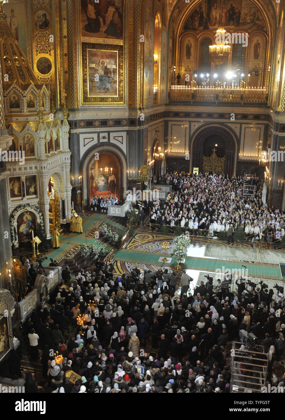 Russian Orthodox believers attend night Christmas service in the Christ