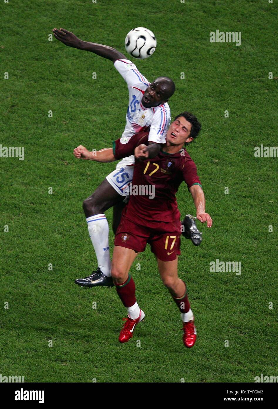 Portugal's Cristiano Ronaldo and France's Lilian Thuram during the semi-final of the FIFA World Cup match in Munich Germany on July 5, 2006. France defeated Portugal 1:0.  (UPI  Photo/Christian Brunskill) Stock Photo