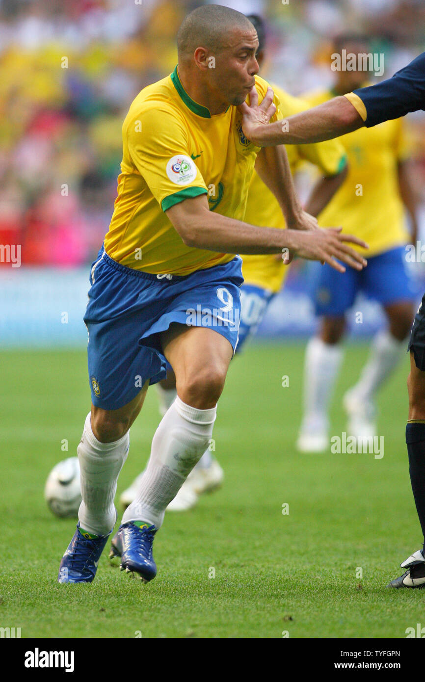 Brazil's player Ronaldo is pushed by Australian player in World Cup soccer action in Munich, Germany on June 18, 2006. Brazil defeated Australia 2-0.  (UPI Photo/Arthur Thill) Stock Photo