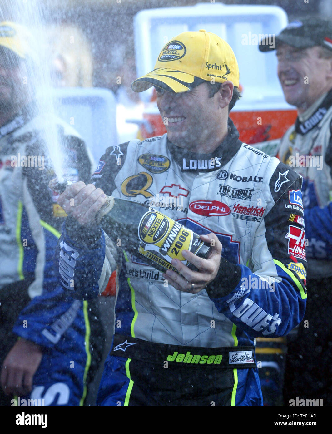 Jimmie Johnson sprays champagne as he celebrates his victory in the Subway 500 race at Martinsville Speedway in Martinsville, Virginia on October 22, 2006. (UPI Photo/Nell Redmond) Stock Photo