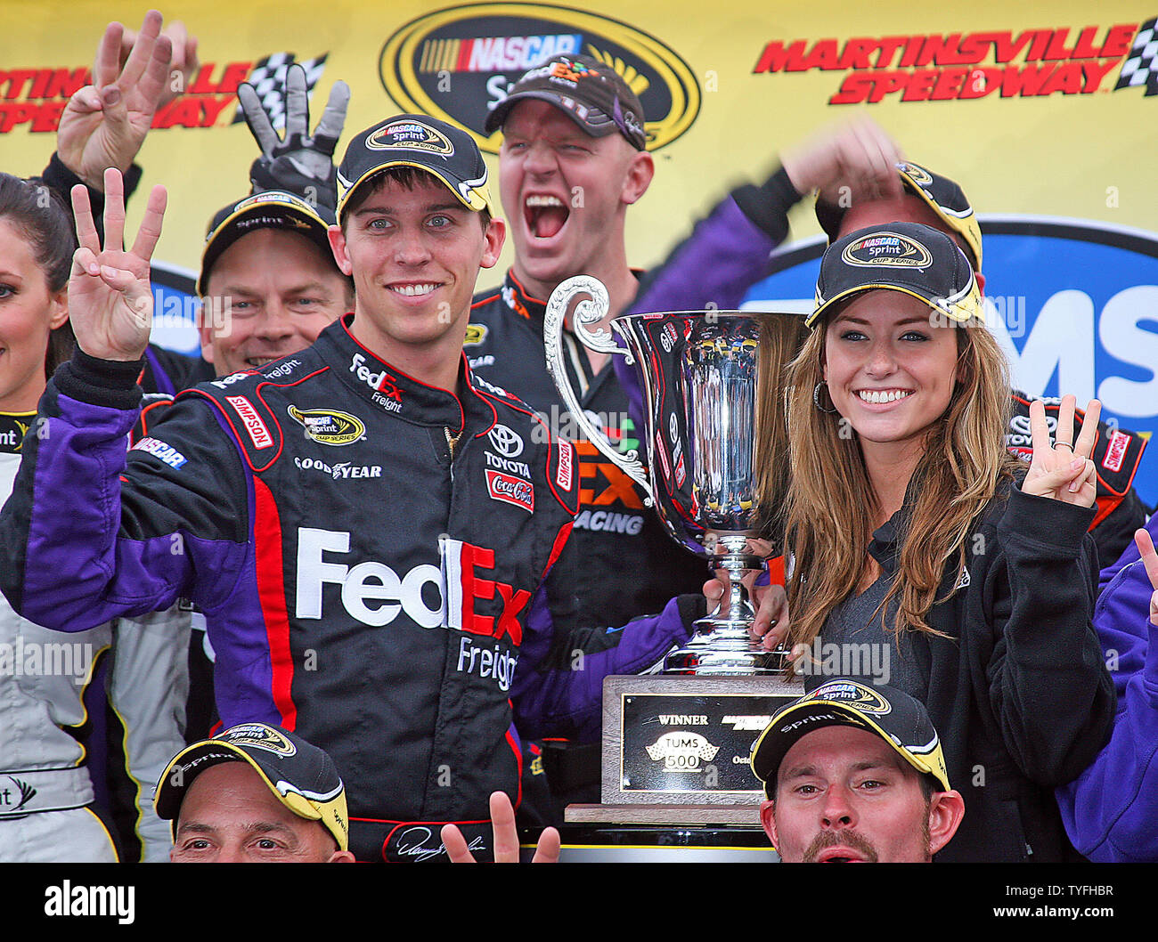 Denny Hamlin celebrates his third win of the season with his girlfriend
