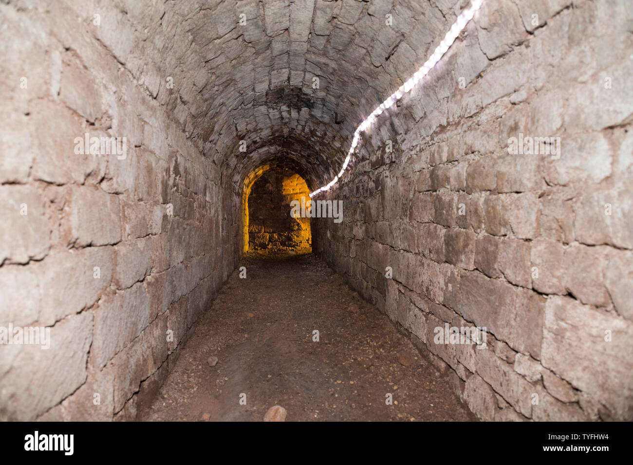 View of the narrow passage that forms Exeter's underground passages and tunnel network of ancient cut and cover tunnels. Exeter. UK (109) Stock Photo