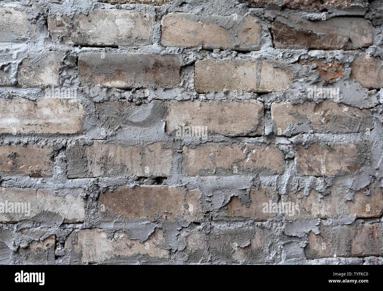 Brick and cement wall close up as a background Stock Photo - Alamy