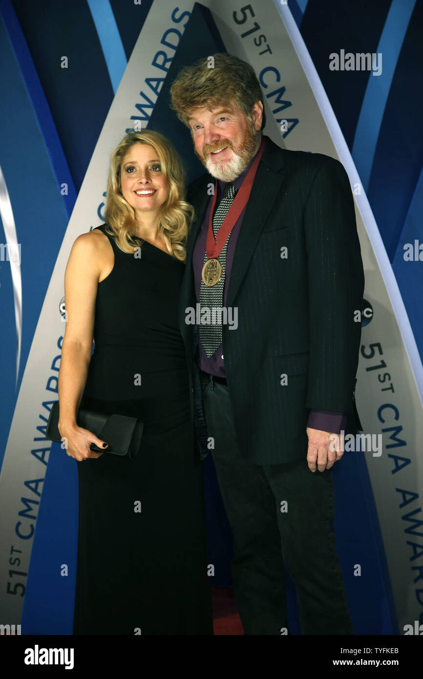 Mac McAnally and his wife Shawna walk the red carpet as they arrive for
