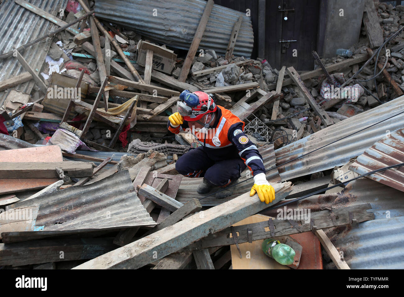 Nepalese rescuers search for victims in the rubble of buildings on April 27, 2015 after a 7.9 earthquake hit the areas in Bhaktapur near Katmandu, Nepal.  The death toll climbed to more than 3,000 with more than 7,000 injured following the massive earthquake in Nepal on Saturday, April 25, 2015.   Photo by Sanjog Manandhar/ UPI Stock Photo