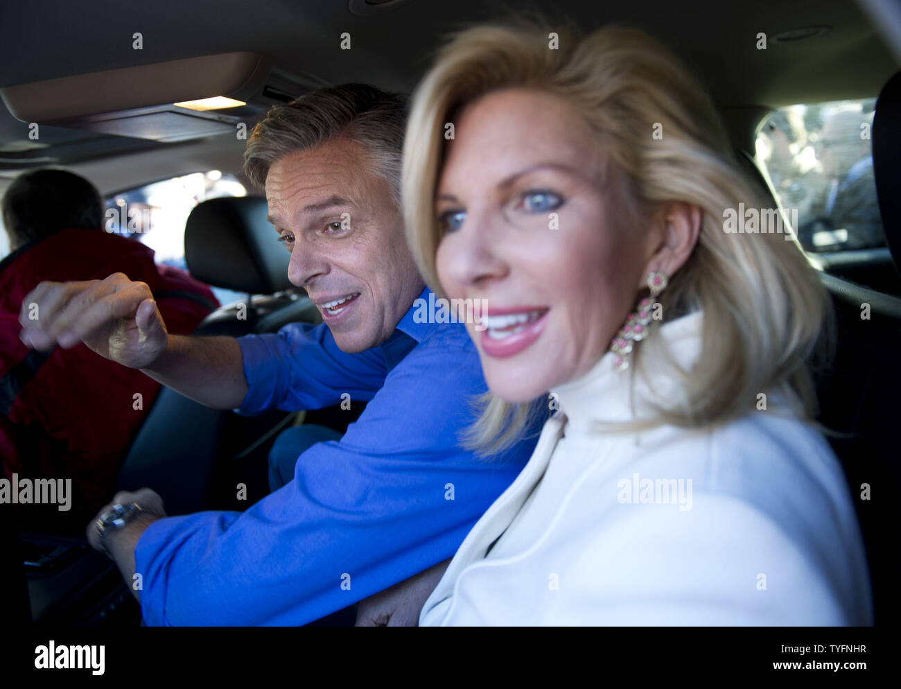 Republican presidential candidate Jon Huntsman and his wife Mary Kaye leave after greeting voters on primary election day at the Webster School polling location in Manchester, New Hampshire on January 10, 2012. UPI/Kevin Dietsch Stock Photo