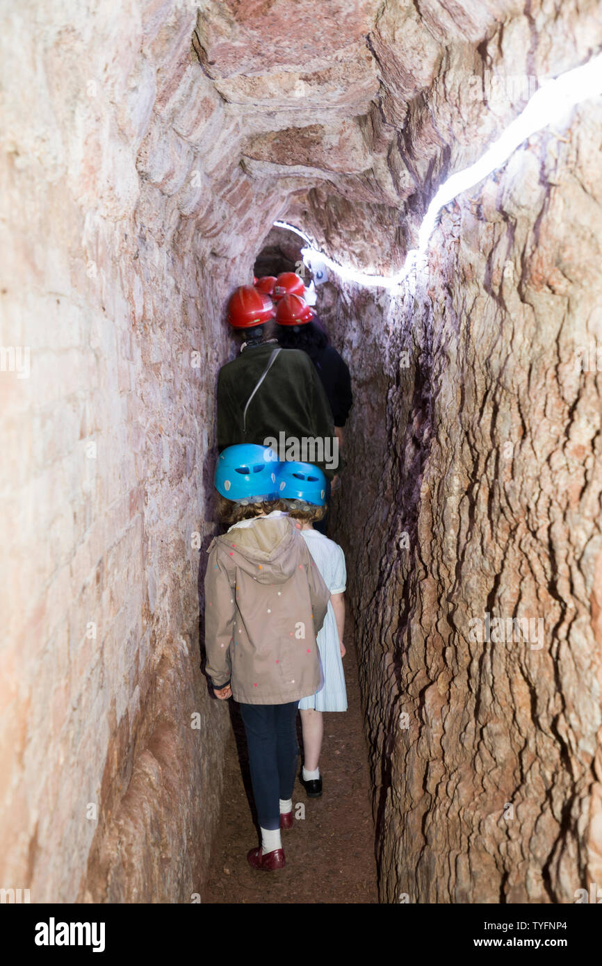 Mother / mum and children kids in Exeter's underground passages and