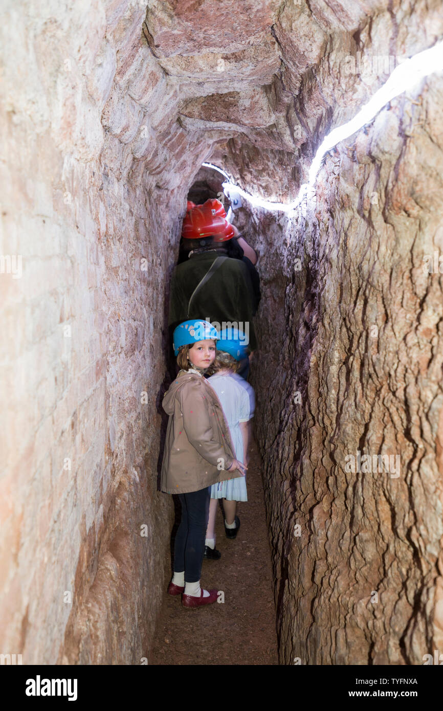 Mother / mum and children kids in Exeter's underground passages and