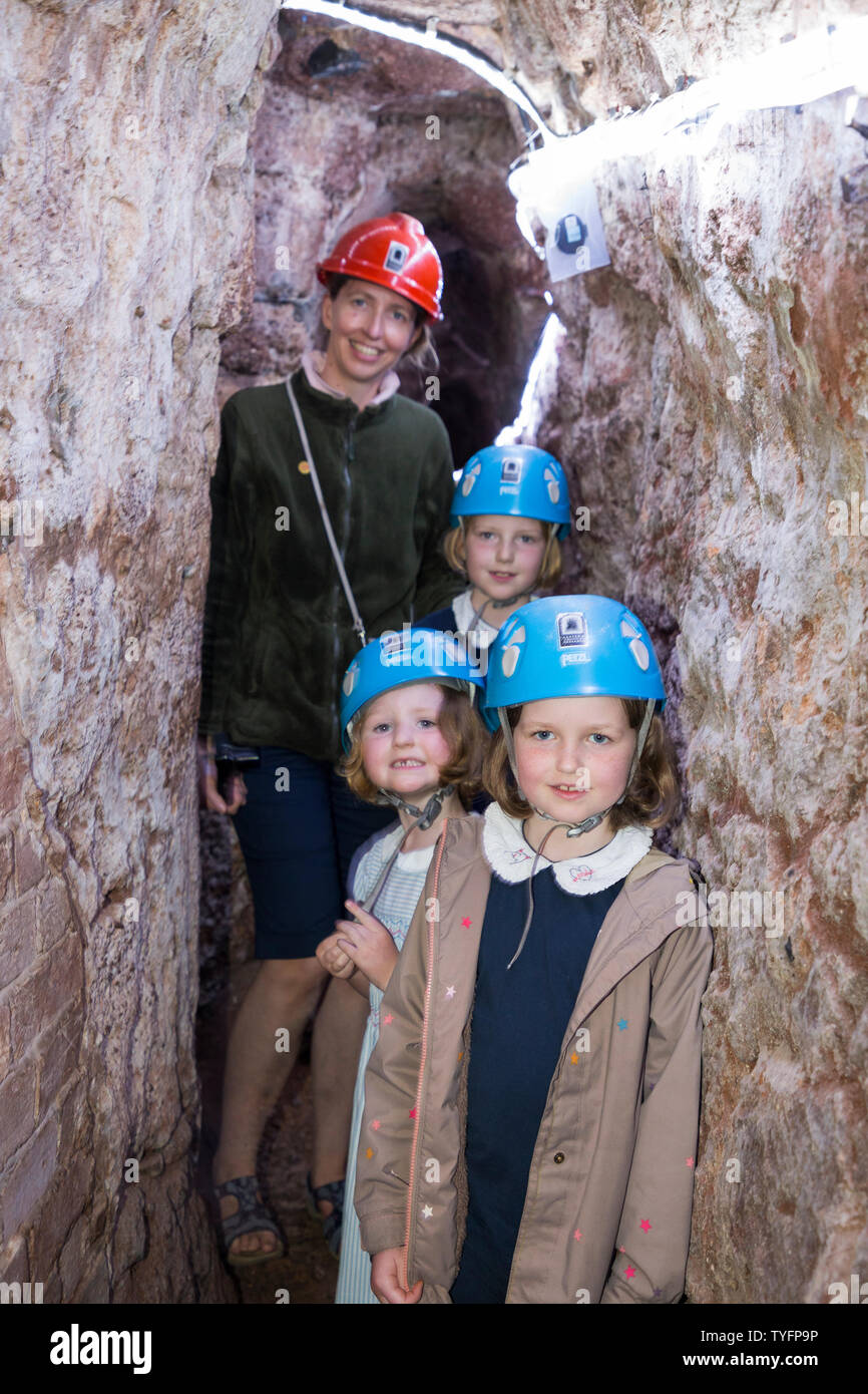 Mother / mum and children kids in Exeter's underground passages and