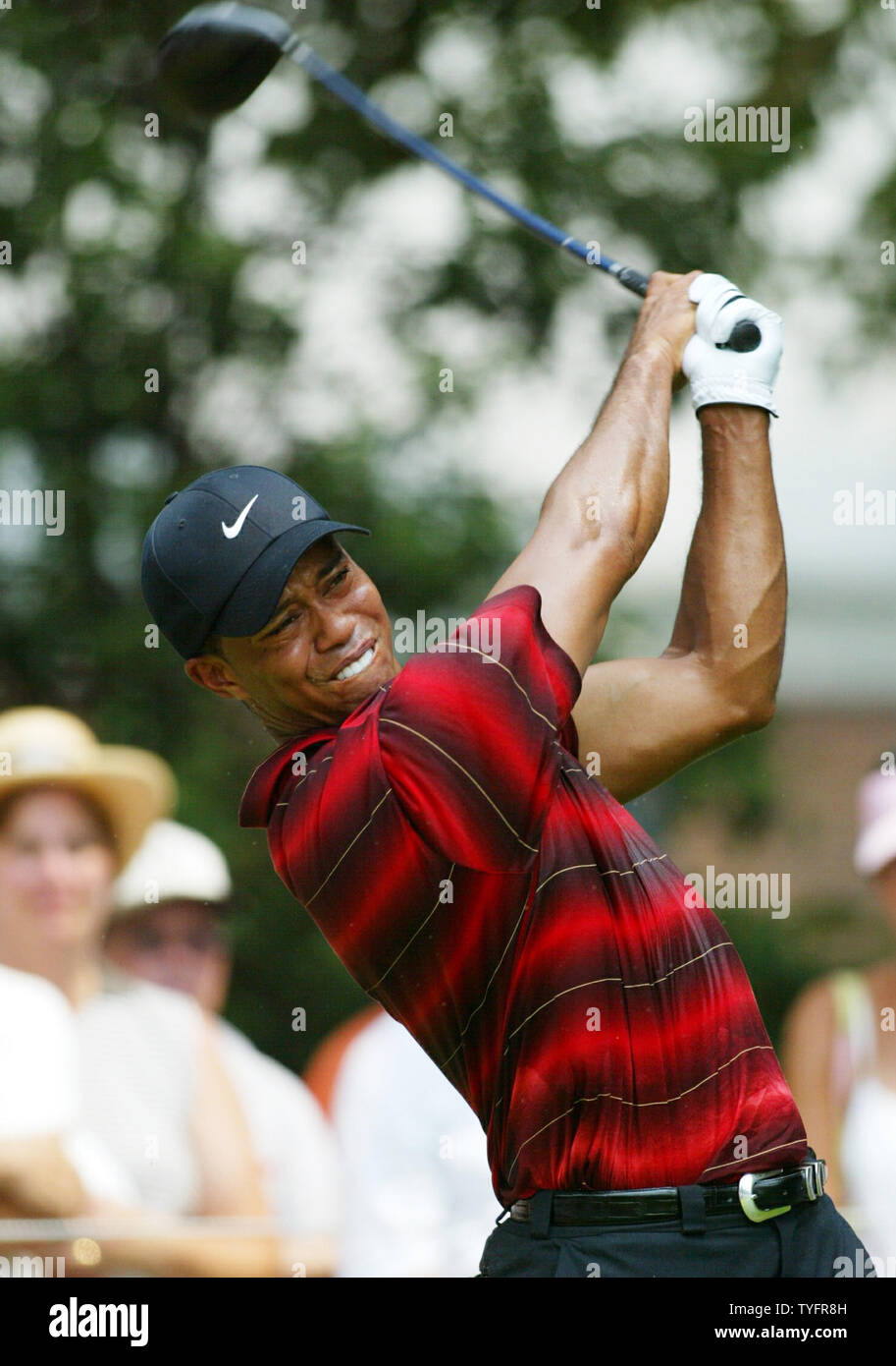 Tiger Woods hits a driver on the third hole during the final round