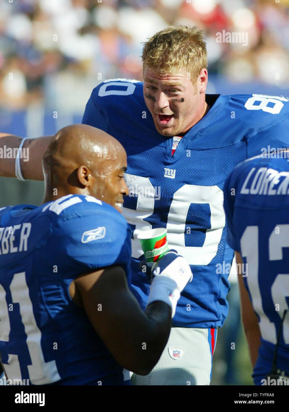 New York Giants Tiki Barber and Jeremy Shockey smile on the sidelines. The  New York Giants hosted the Arizona Cardinals in week 1 at Giants Stadium in  East Rutherford New Jersey on
