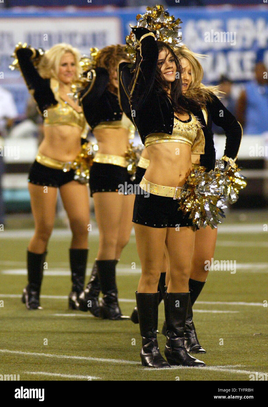 New Orleans Saints cheerleaders cheer for their team. The New York Giants hosted the New Orleans Saints in week 2 for Monday Night Football at Giants Stadium in East Rutherford New Jersey on September 19, 2005.    (UPI Photo/John Angelillo) Stock Photo