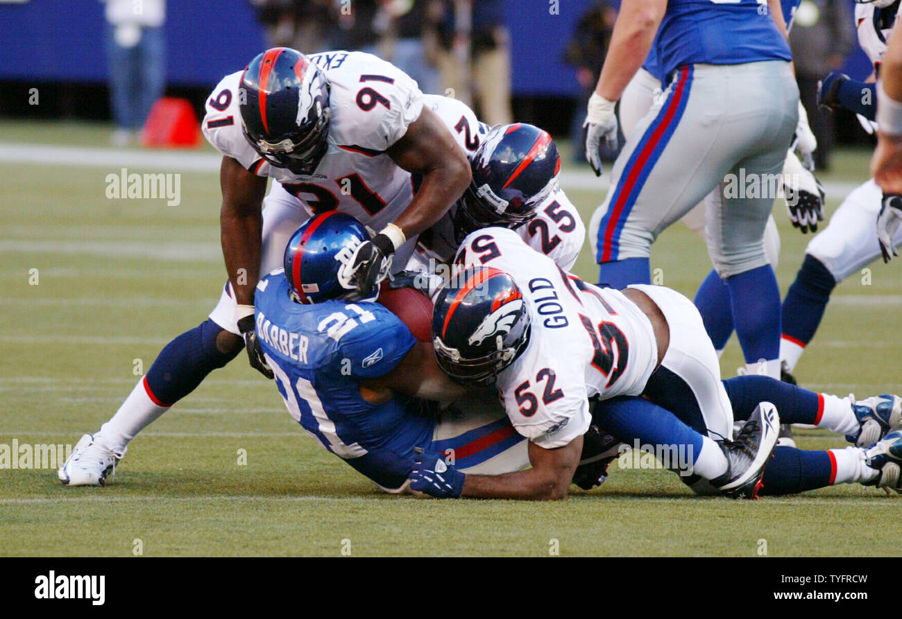 NY Giants runningback Tiki Barber runs down the sideline. The Atlanta  Falcons defeated the NY Giants 27-7 at the Meadowlands in East Rutherford  NJ on November 9, 2003. (UPI/John Angelillo Stock Photo - Alamy