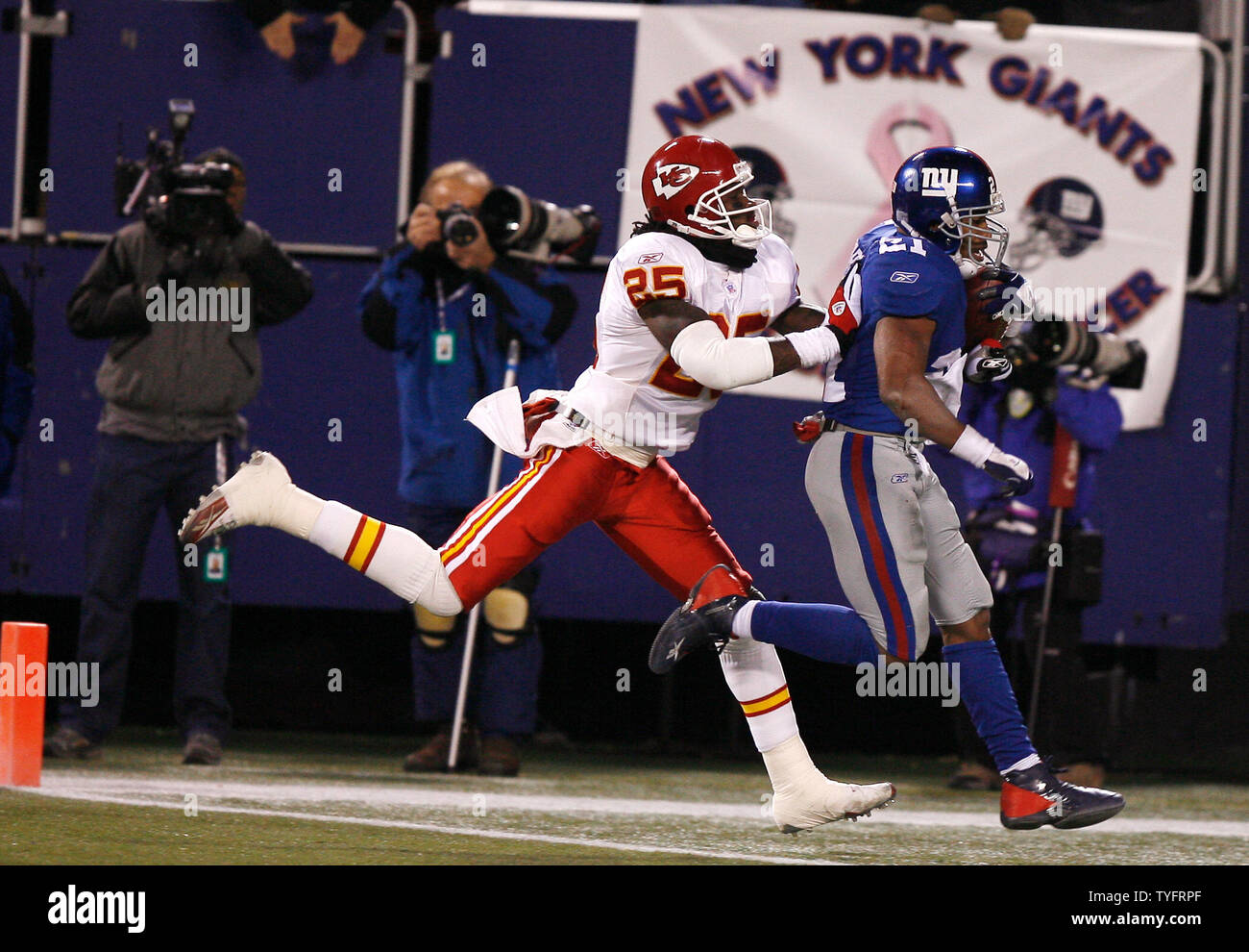 New York Giants runningback Tiki Barber scores the first touchdown of the  game in week 15 at Giants Stadium in East Rutherford, New Jersey on  December 17, 2005. The New York Giants
