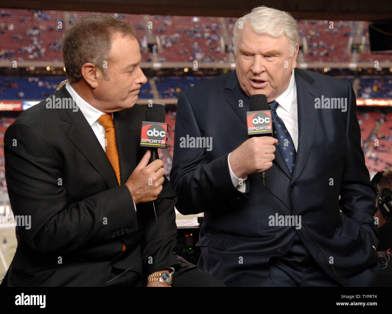 John Madden and Al Michaels do their last broadcast of ABC's Monday Night Football at Giants Stadium in East Rutherford, New Jersey on December 26, 2005. The New England Patriots defeated the New York Jets 21-7.   (UPI Photo/Ida Mae Astute/ Pool) Stock Photo