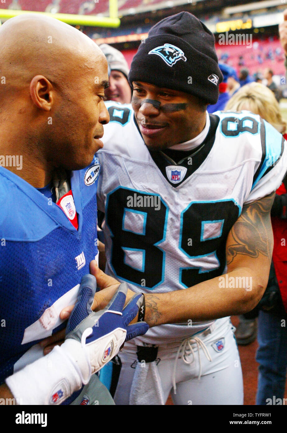 New York Giants Tiki Barber (L) and Carolina Panthers wide receiver Steve  Smith exchange words after an NFC wild card game at Giants Stadium in East  Rutherford, New Jersey on January 8,