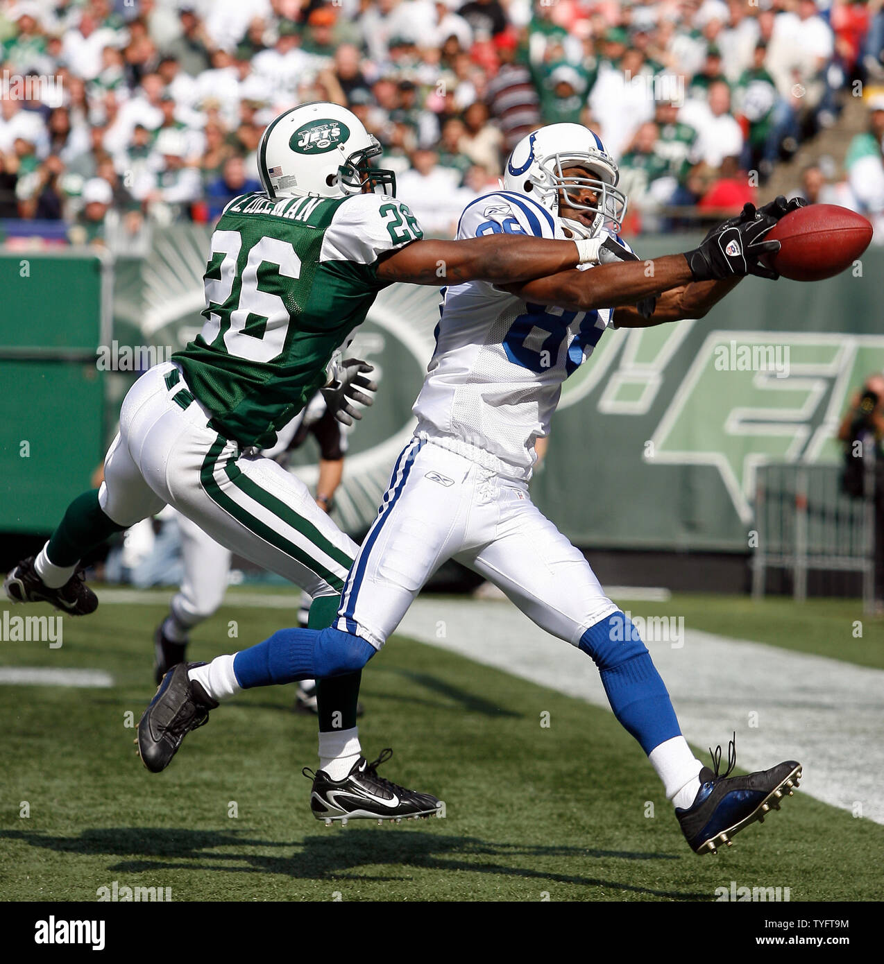 New York Jets Erik Coleman tries to bring down Philadelphia Eagles Brian  Westbrook in the second quarter at Giants Stadium in East Rutherford, New  Jersey on October 14, 2007. The Philadelphia Eagles