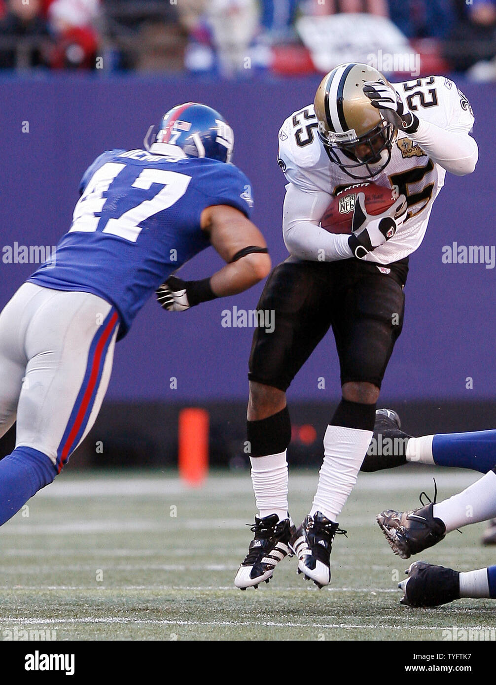 New Orleans Saints Reggie Bush gets hit hard by New York Giants Will Demps  in the 2nd quarter at Giants Stadium in East Rutherford, New Jersey on  December 24, 2006. The New