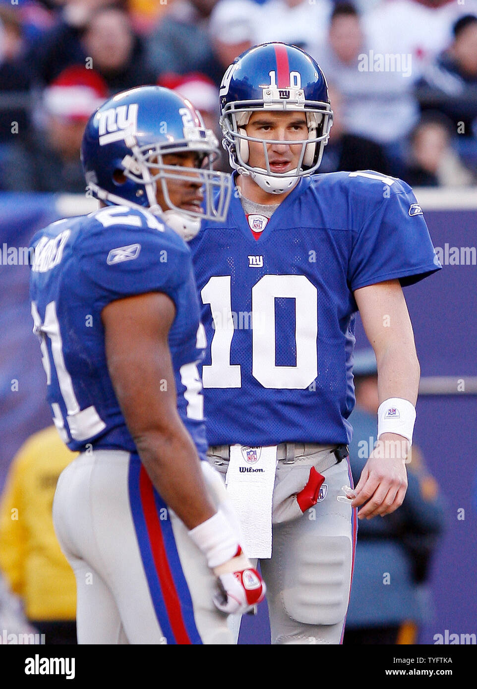 New York Giants Tiki Barber and Eli Manning look at the sidelines in  between plays in the 2nd quarter at Giants Stadium in East Rutherford, New  Jersey on December 24, 2006. The