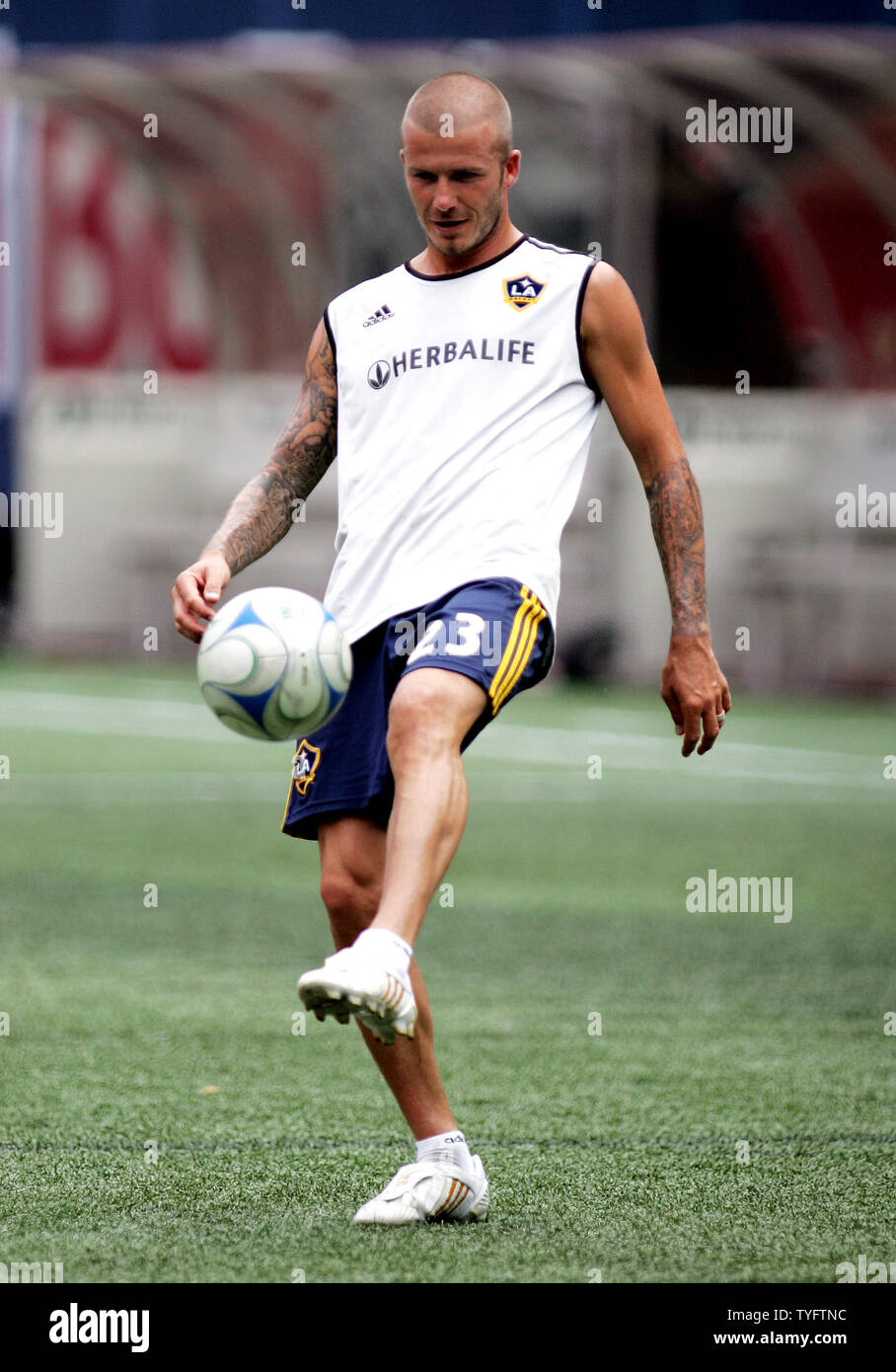 Los Angeles Galaxy star David Beckham kicks the ball during practice ...