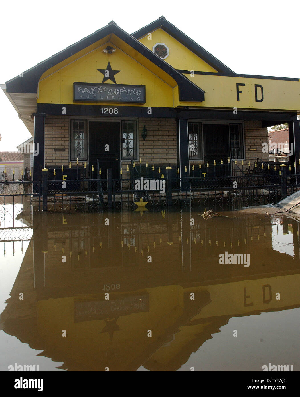 Fats Domino's house is innundated by flood water from a levee break, caused by Hurricane Katrina, in the streets of the Ninth Ward of New Orleans on Sept. 3, 2005.   (UPI Photo/Roger L. Wollenberg) Stock Photo
