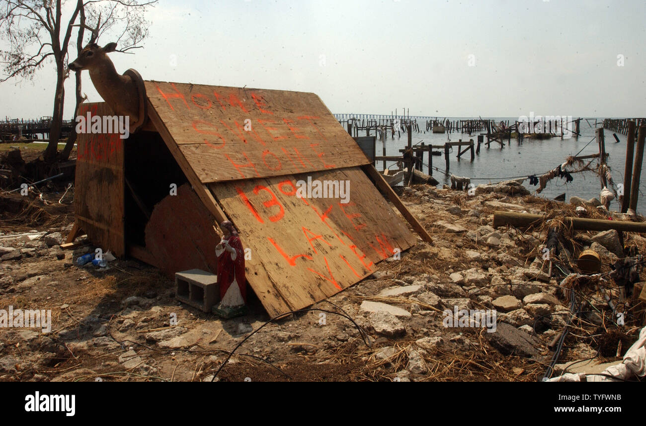 A person used plywood to create a structure resembling a home where his house used to stand in Slidell, La., on Sept. 10, 2005. Dozens of homes were completely wiped out during Hurricane Katrina and boats were scattered throughout the town on Lake Pontchartrain. (UPI Photo/Roger L. Wollenberg) Stock Photo