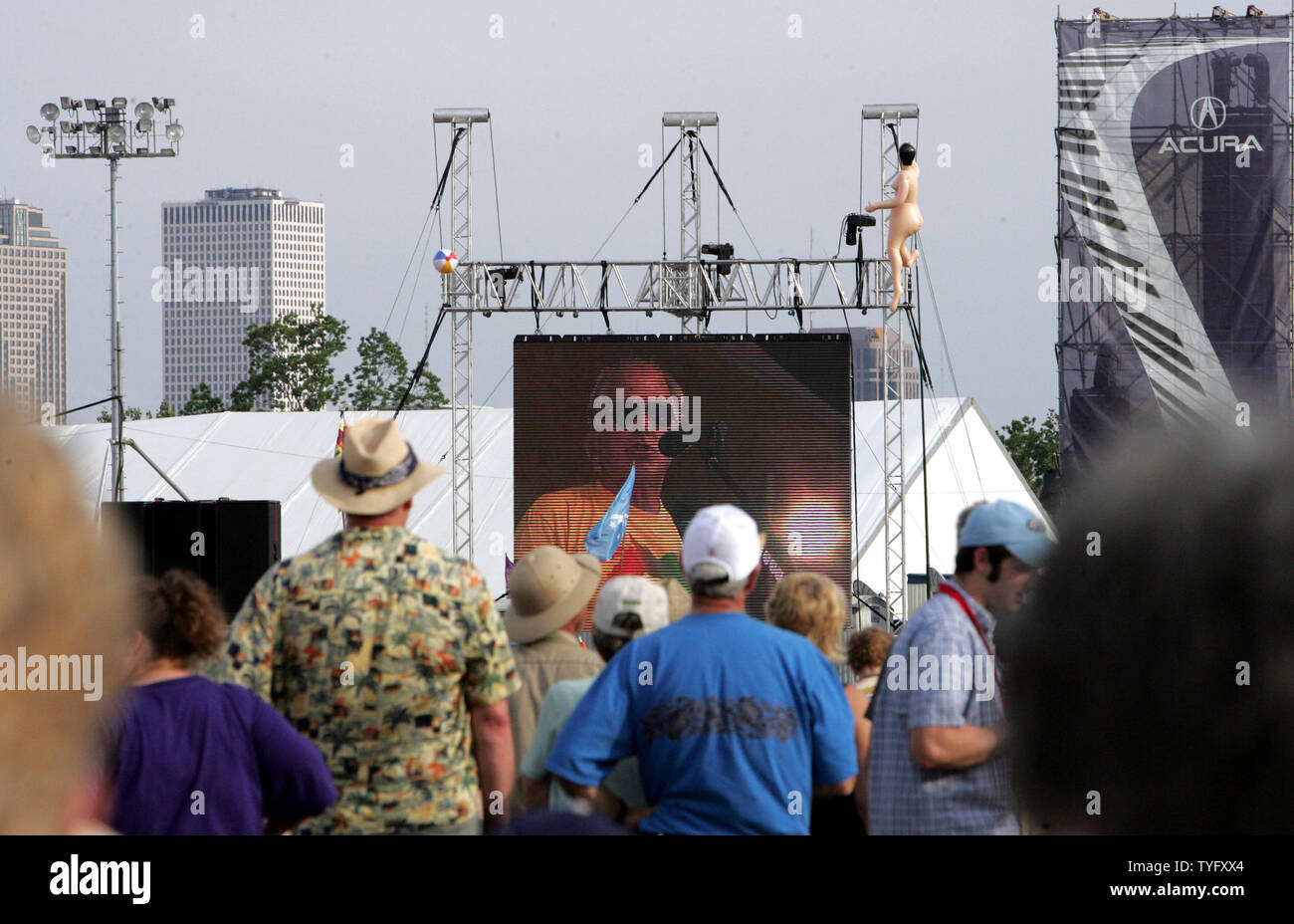 Jimmy Buffett's image appears on a big screen as he performs during the 2006 New Orleans Jazz & Heritage Festival at the New Orleans Fair Grounds May 6, 2006. The festival is the first major musical event to be held in New Orleans since Hurricane Katrina devastated the area last year, leaving vast parts of the city still uninhabitable.   (UPI Photo/Judi Bottoni) Stock Photo