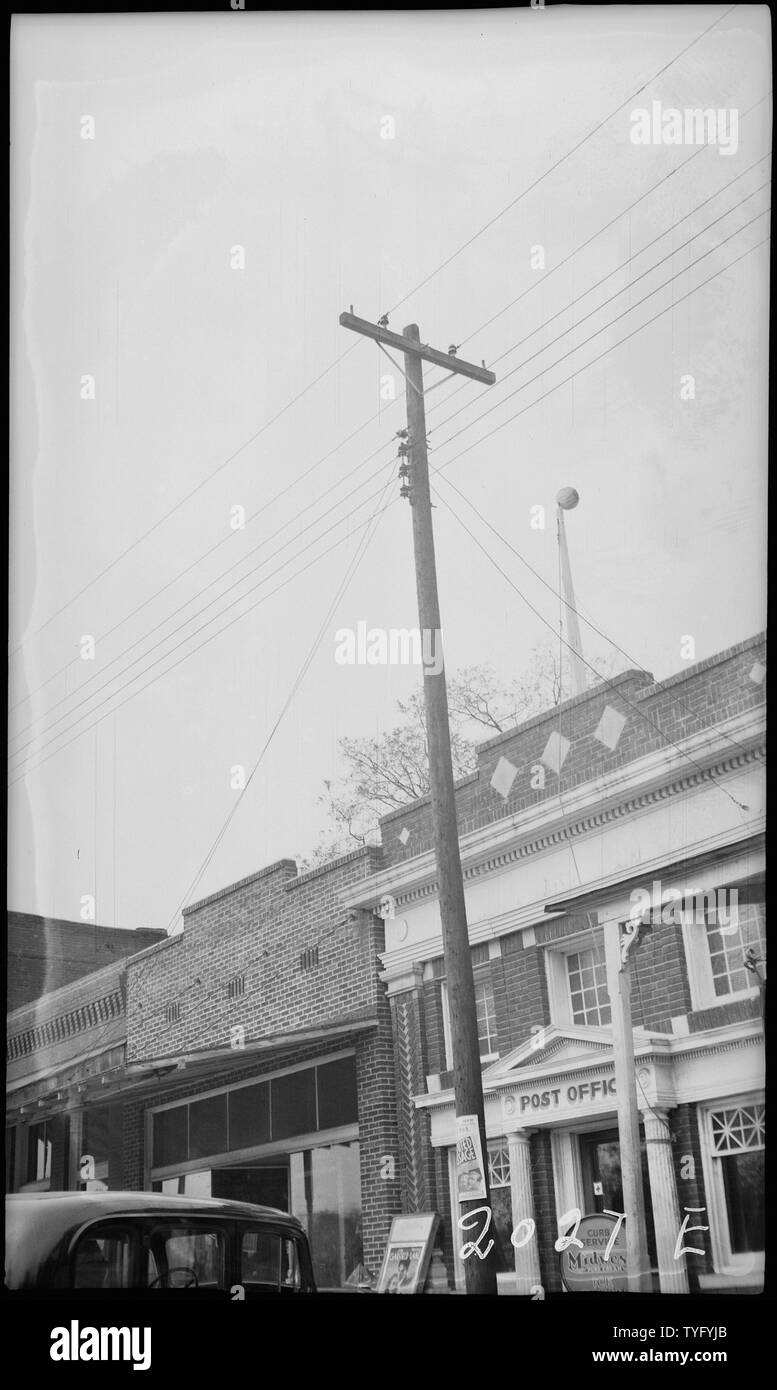 Post Office; General notes:  Where is this located?  Despite previous statements here, this appears NOT to be the post office in Trenton, Tennessee which is listed on the National Register of Historic Places, because this photo does not match up to photos of it (see https://npgallery.nps.gov/AssetDetail/NRIS/88001576) or to Google streetview for 200 South College St. in Trenton.  See wikipedia article https://en.wikipedia.org/wiki/US Post Office (Trenton, Tennessee). Stock Photo