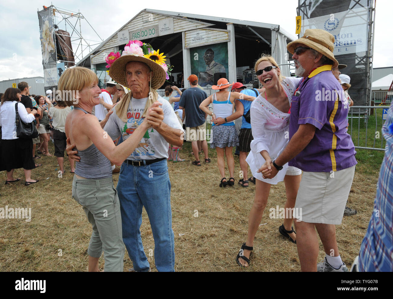 Cajun dancers enjoy the music of Hadley J. Castille and the Sharecropper Band at the Fais Do Do stage of the 2008 New Orleans Jazz and Heritage Festival in New Orleans on April 26, 2008. The Jazz Fest is a 10-day cultural feast in which thousands of musicians, cooks and craftspeople welcome 400,000 visitors each year.  (UPI Photo/Pat Benic) Stock Photo