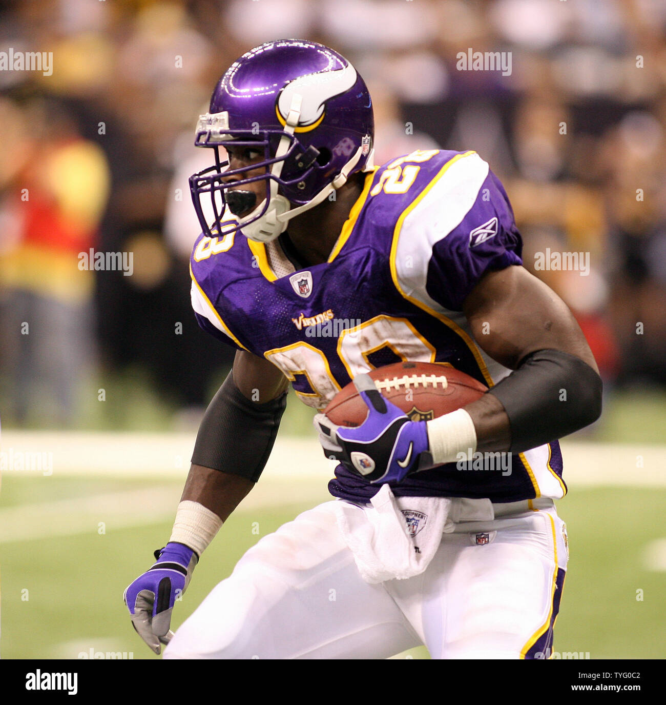 Minnesota Vikings running back Adrian Peterson carries the ball