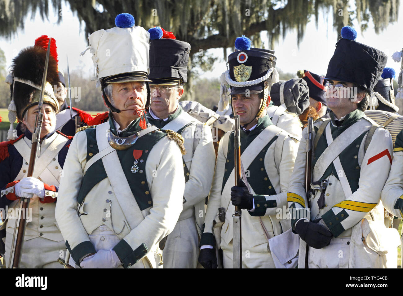 Reenactors dressed in the uniforms of Major Plauche's Battalion, who