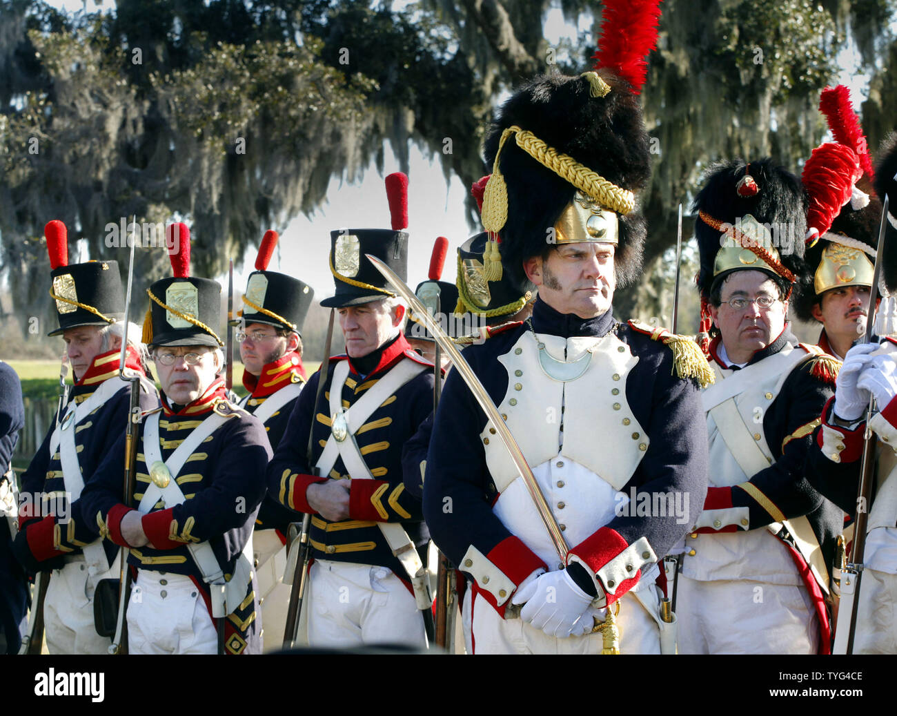 Reenactors dressed in the uniforms of Major Plauche's Battalion, right