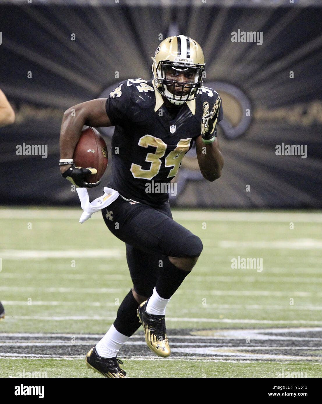 New Orleans Saints running Tim Hightower (34) in action against the Detroit Lions during the fourth quarter at the Mercedes-Benz Superdome in New December 21, 2015. by Sisco/UPI