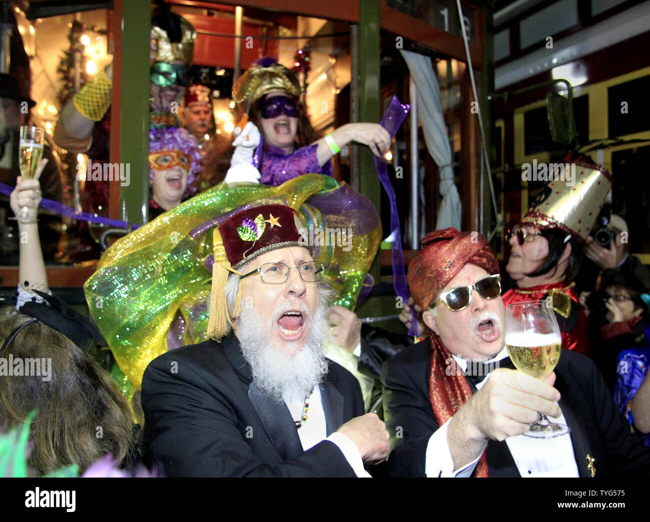 Member of the Phunny Phorty Phellows, 'The Heralds of Carnival,' celebrates the start of the 2016 Carnival season in New Orleans with a streetcar ride down St. Charles Avenue on Twelfth Night, January 6, 2016.The Mardi Gras organization is known for its satirical parade, and members' costumes often reflect topical themes.  Photo by AJ Sisco/UPI Stock Photo
