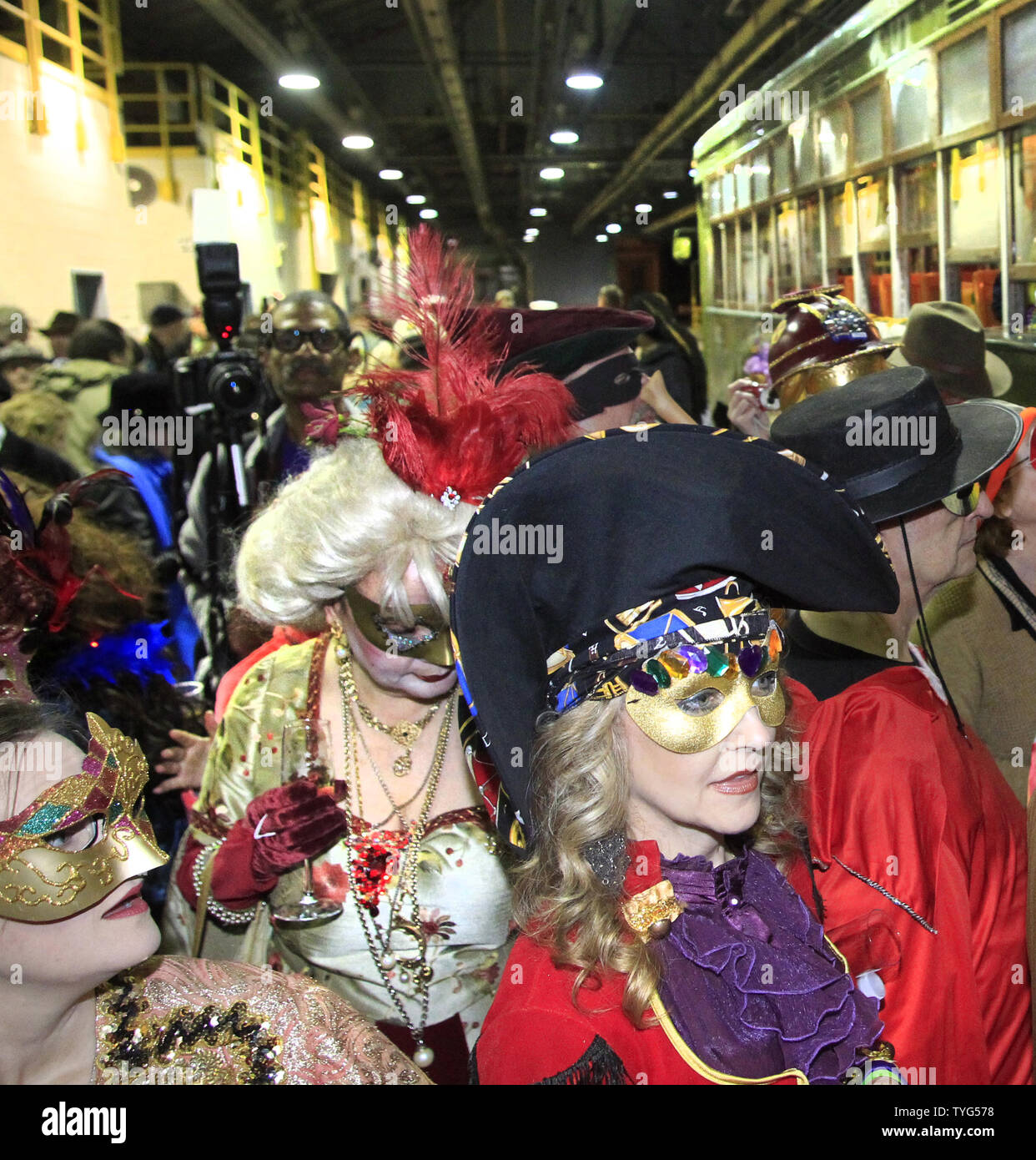 Member of Phunny Phorty Phellows, 'The Heralds of Carnival,' celebrates the start of the 2016 Carnival season in New Orleans with a streetcar ride down St. Charles Avenue on Twelfth Night, January 6, 2016.The Mardi Gras organization is known for its satirical parade, and members' costumes often reflect topical themes.  Photo by AJ Sisco/UPI Stock Photo