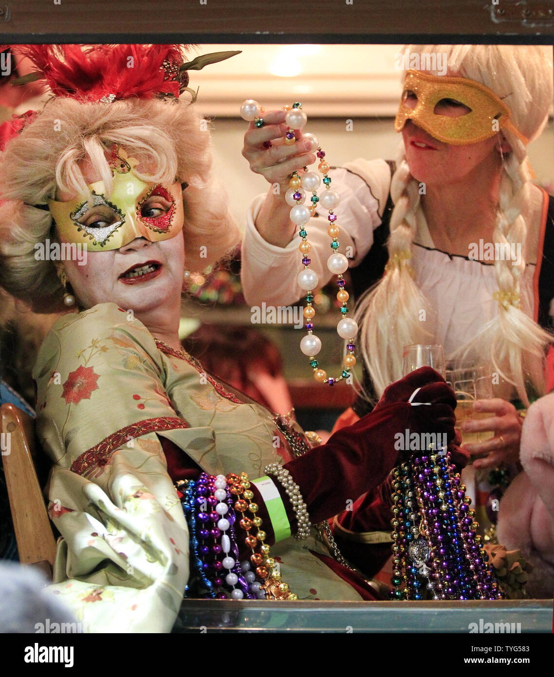 Members of the Phunny Phorty Phellows, 'The Heralds of Carnival,' celebrates the start of the 2016 Carnival season in New Orleans with a streetcar ride down St. Charles Avenue on Twelfth Night, January 6, 2016.The Mardi Gras organization is known for its satirical parade, and members' costumes often reflect topical themes.  Photo by AJ Sisco/UPI Stock Photo