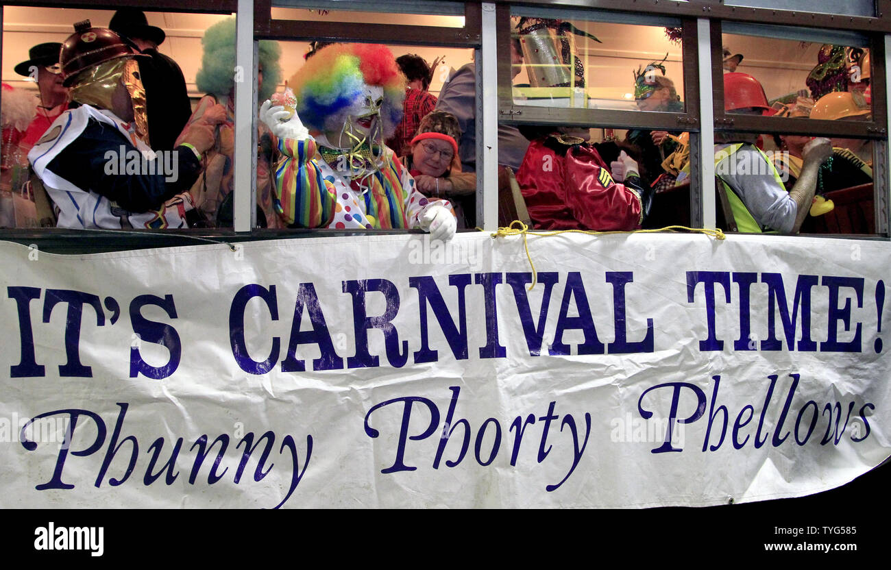 Members of the Phunny Phorty Phellows, 'The Heralds of Carnival,' celebrates the start of the 2016 Carnival season in New Orleans with a streetcar ride down St. Charles Avenue on Twelfth Night, January 6, 2016.The Mardi Gras organization is known for its satirical parade, and members' costumes often reflect topical themes.  Photo by AJ Sisco/UPI Stock Photo