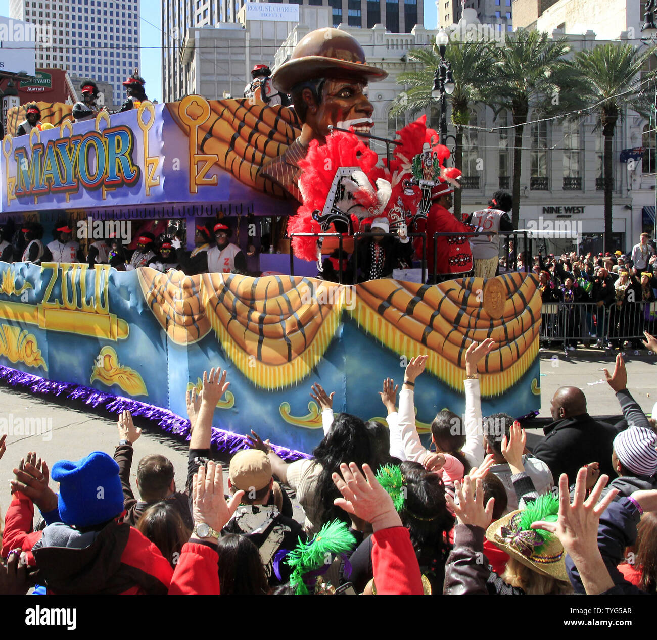 Thousands of Mardi Gras revelers crowd downtown New Orleans
