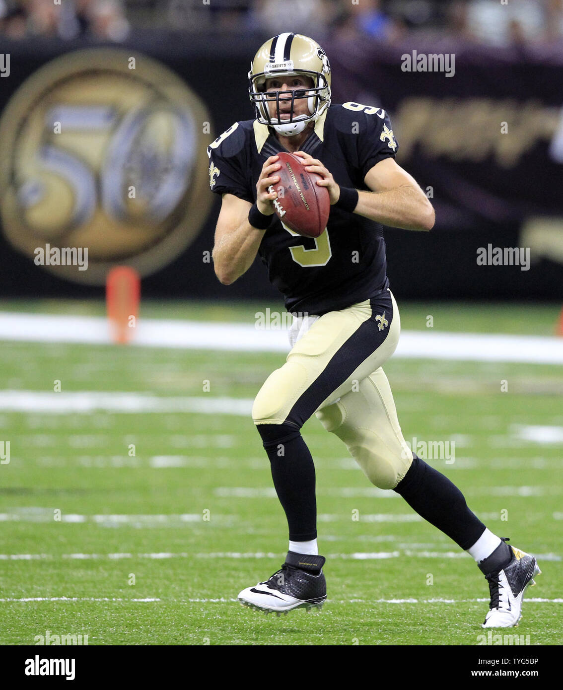 New Orleans Saints quarterback Drew Brees (9) throws the ball down the  field against the Philadelphia Eagles at the Mercedes-Benz Superdome in New  Orleans, Louisiana on November 5, 2012. Brees threw a